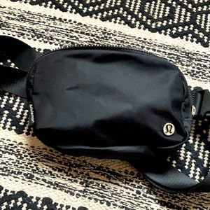 Lululemon black belt bag, used once, excellent condition